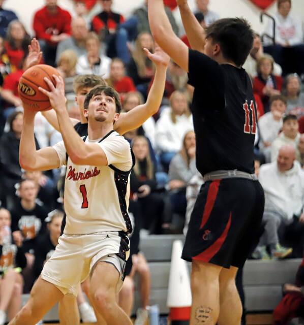 Mohawks Bobby Fadden attempts to get a shot past Southmorelands Ty Whoric last season. (Josh Rizzo | For TribLive)