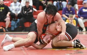 Moons Khalil Razipour beats North Hills Cameron Healey in the 215-pound final during the Allegheny County wrestling championship Saturday at Fox Chapel. (Chaz Palla | TribLive)