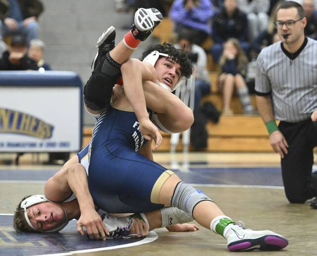 Franklin Regionals Max Firestine beats Norwins Nathan Klingensmith during the 145-pound bout Wednesday, Jan. 20, 2026 at Franklin Regional High School. (Chaz Palla | TribLive)