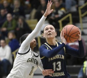 Franklin Regional’s Katherine Yaniga scores past Gateway’s Jahnye Bryant during their game on Friday, Jan. 23, 2026, in Monroeville. Yaniga scored a game-high 21 points. (Christopher Horner | TribLive)