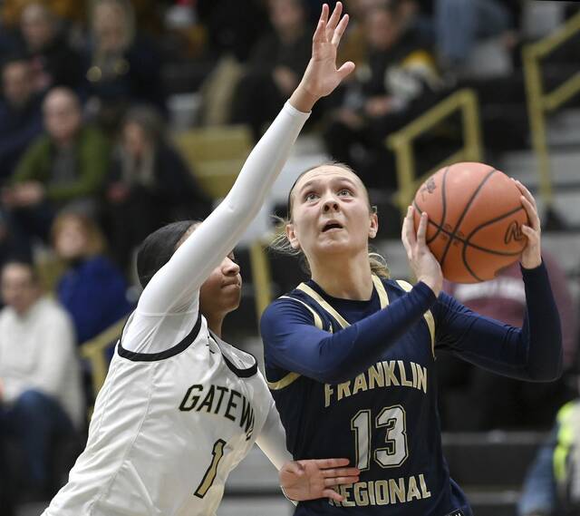 Franklin Regional’s Katherine Yaniga scores past Gateway’s Jahnye Bryant during their game on Friday, Jan. 23, 2026, in Monroeville. Yaniga scored a game-high 21 points. (Christopher Horner | TribLive)