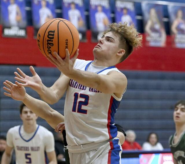 Chartiers Valley’s Julian Semplice scores during the first quarter against Allderdice on Wednesday, Jan. 14, 2026, at Chartiers Valley. (Christopher Horner | TribLive)