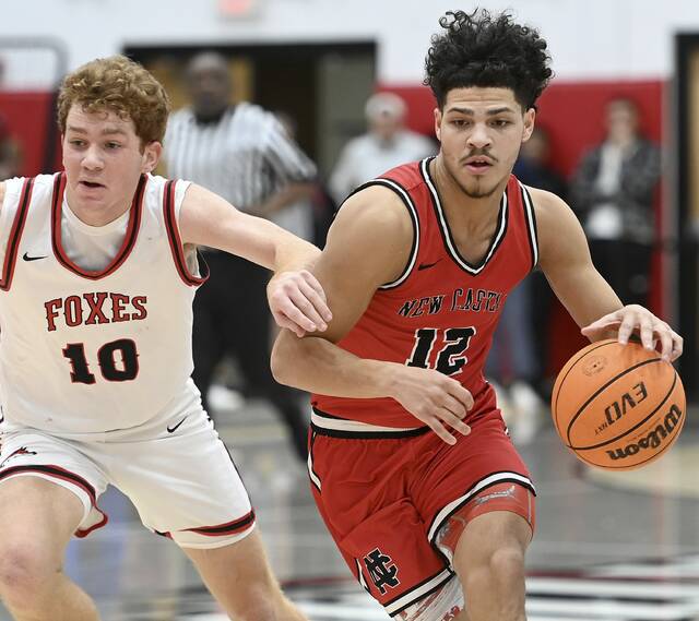 New Castle’s Kai Cox drives past Fox Chapel’s Anderson Dockey during their game on Friday, Jan. 9, 2026 at Fox Chapel. (Christopher Horner | TribLive)