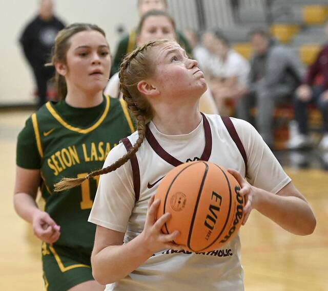 Greensburg Centrals Nolan Althof drives to the basket against Seton LaSalle on Dec. 30, 2025. (Christopher Horner | TribLive)