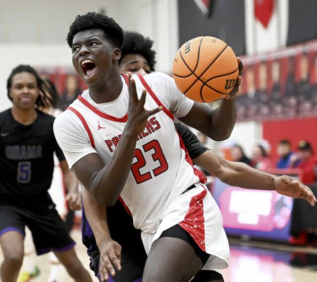 Sewickley Academys Mamadou Kane drives to the basket against Obama Academy on Wednesday in Sewickley. (Christopher Horner | TribLive)