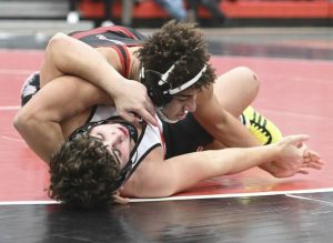 Fox Chapels Calyx Kimbrough pins Peters Townships Luke Kail in the 160-pound bout Dec. 3 at Fox Chapel. (Chaz Palla | TribLive)