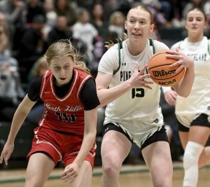Pine-Richland’s Rebekah Shaffer drives past North Hills’ Zoe Devlin during their game on Thursday, Jan. 29, 2026, in Pine. (Christopher Horner | TribLive)