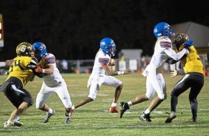 Jeannettes Kymone Brown looks for a seam in the Bentworth defense during Fridays WPIAL Class A first-round playoff game. (Floyd Kish | Mon Valley Independent)