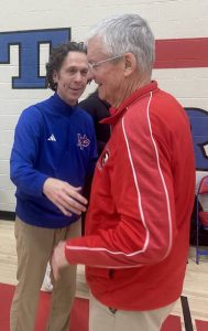 Mt. Pleasant coach Mark Katarski (left) congratulates Charleroi coach Joe Dunn, a former Mt. Pleasant coach, after Charlerois victory Friday in Mt. Pleasant Township. (Dave Mackall | For TribLive)