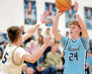 Burrell's Ryan Wass attempts a 3-pointer over Freeport's Gavin Tola on Friday, Jan. 30, 2026. Wass finished with a game-high 19 points. (Josh Rizzo | For TribLive)
