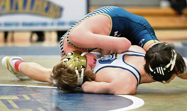Franklin Regionals Beau Fennick pins Norwins Gabriel Hawkingberry earlier this month. (Chaz Palla | TribLive)