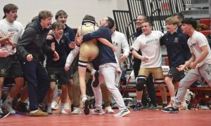 Franklin Regionals Sal Colangelo beats Norwins Luca Butera in the 107-pound bout in the last match of the night to clinch the title during the WPIAL Class 3A team wrestling championship Saturday at Peters Township High School. (Chaz Palla | TribLive)