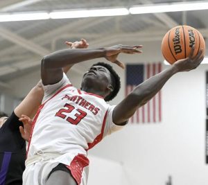 Sewickley Academys Mamadou Kane scores against Obama Academy on Wednesday. (Christopher Horner | TribLive)