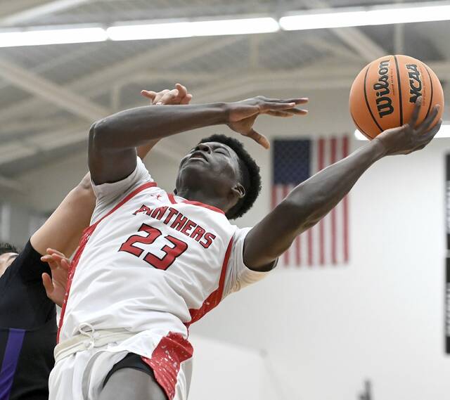 Sewickley Academys Mamadou Kane scores against Obama Academy on Wednesday. (Christopher Horner | TribLive)