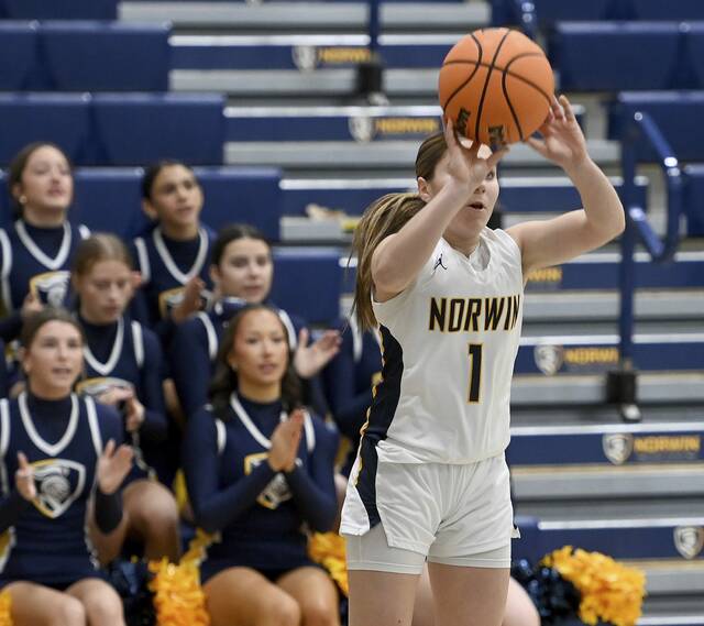 Norwins Giuliana Giannikas shoots a 3-pointer against Upper St. Clair on Tuesday. (Christopher Horner | TribLive)