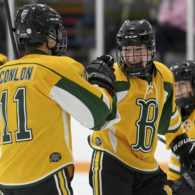 Blackhawks Grant Shroads celebrates with Finn Conlon after scoring during their game against Hampton on Thursday, Nov. 20, 2025, at the Bradys Run Park ice arena. (Christopher Horner | TribLive)