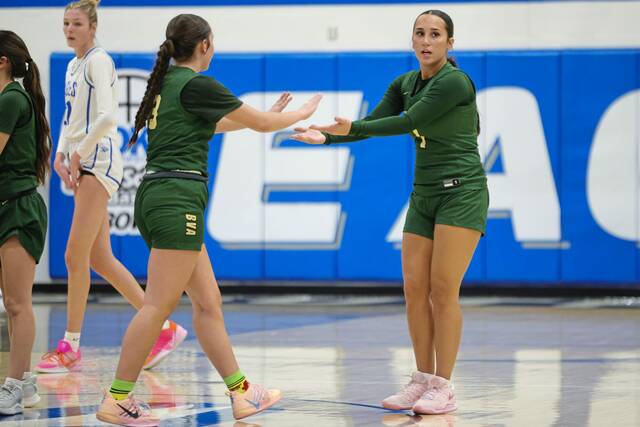 Belle Vernon's Lyla McConnell and Emerson LaCarte celebrate during a game against South Park on Thursday, Jan. 22, 2026. (Jeff Helsel | Mon Valley Independent)