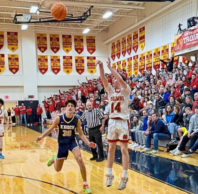 North Catholics Jake Olkowski shoots a 3-pointer against Knoch on Jan. 9 at North Catholic. (Antonio Rossetti | For TribLive)