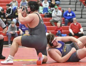 North Allegheny’s Bradyn McConneha celebrates after beating Plum’s Frank Grazulis in the 285 pound bout during the Allegheny County wrestling championship Saturday Jan. 17, 2026 at Fox Chapel Area High School. (Chaz Palla | TribLive)