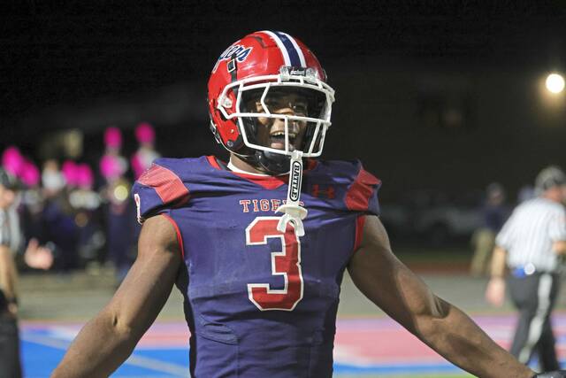 McKeesports Kemon Spell celebrates a touchdown against Mars on Friday, Oct. 10, 2025. (Jeff Helsel | Mon Valley Independent)
