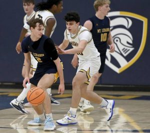 Mt. Lebanons Liam Sheely works against Norwins Nate Kuch on Jan. 27. (Christopher Horner | TribLive)