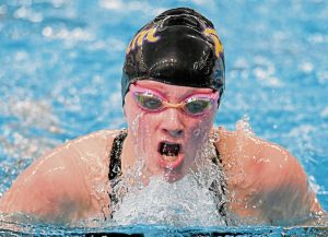 Plums Brooke Price swims the 200-yard individual medley at last seasons WPIAL championships. She finished 16th. (Andrew Palla | For TribLive)