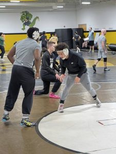 Junior Braden Washington (right) practices Feb. 2 at Gateways Furrie Sports Complex. (Michael Love | TribLive)