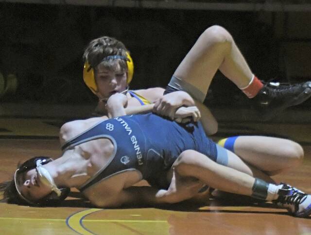 Derry freshman Patrick Bulger gets back points on Blake Brumbaugh of Penns Valley on Tuesday. (Paul Schofield | TribLive)