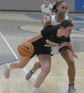 Norwins Lenyn Brozeski (10) drives around Hempfields Ava Shipman in the first half Thursday. (Paul Schofield | TribLine)