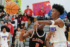 Jeannettes Kymone Brown passes the ball against Clairton last month. (Paul Schofield | TribLive)