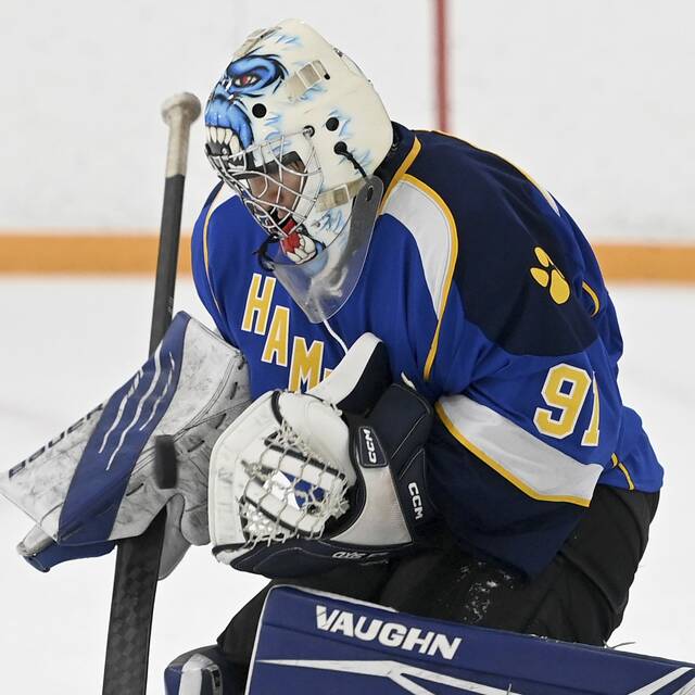 Hampton goalie Konstantone Sarris makes a save against Blackhawk on Thursday, Nov. 20, 2025, at the Bradys Run Park ice arena. (Christopher Horner | TribLive)