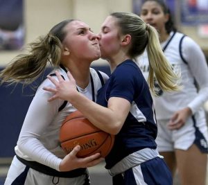 Franklin Regionals Megan Kavo drives to the basket against Shalers Allison Greygor on Feb. 5. (Christopher Horner | TribLive)