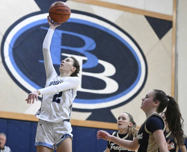 Burrells Casey Brancato scores past Freeports Jaisa Gaillot and Maggie Conger last month. The Bucs open the playoffs Monday against Hampton. (Chaz Palla | TribLive)