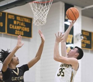 Penn Traffords Zachary Feldman scores over Gateways Mykel Bruce-McCrommon earlier this month. (Chaz Palla | TribLive)