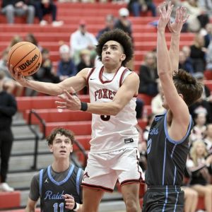 Fox Chapels John Rehak scores against Seneca Valley on Dec. 12. (Christopher Horner | TribLive)