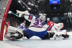 United States goalie Gwyneth Philips makes a save during a game against Switzerland at the Winter Olympics in Milan, Italy, on Feb. 9. (AP)