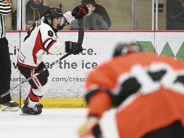 Fox Chapels Tucker Cullen celebrates his first-period goal against Cathedral Prep during the PIHL Class 2A championship March 18, 2025. (Chaz Palla | TribLive)