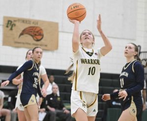 Penn-Traffords Olivia Weishaar scores past Franklin Regionals Gemma Sadoski during their WPIAL Class 5A first-round game Friday. (Chaz Palla | TribLive)