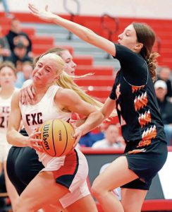 Fox Chapel's Lyla Jablon is fouled on her way to the rim during the first half of a WPIAL Class 5A playoff game against Latrobe on Friday. (Josh Rizzo | For TribLive)