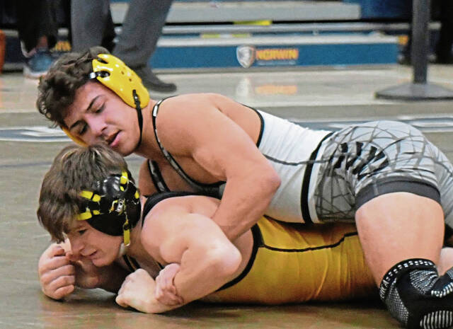 Penn-Trafford senior Dylan Barrett takes down Thomas Jefferson junior Zach Rehak in the 114-pound final at the WPIAL Class 3A Eastern Section tournament Saturday. (Paul Schofield | TribLive)