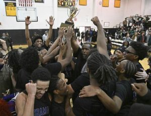 Obama Academy celebrates after beating Allderdice during the City League championship Sunday, Feb. 15, 2026 at Brashear High School. (Chaz Palla | TribLive)