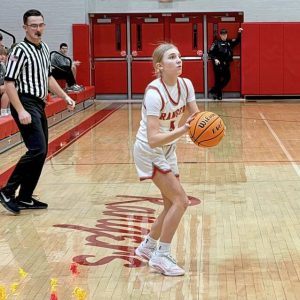 Fort Cherrys Gianna Bianchini eyes up a 3-pointer against Riverview in the WPIAL Class 2A first round Tuesday. (Antonio Rossetti | For TribLive)