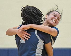 Rochesters Kamryn Newman (back) and Marque Taylor (2) celebrate during a win over Riverview in the WPIAL playoffs last year. (Andrew Palla | For TribLive).