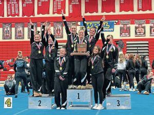 The Thomas Jefferson gymnasts celebrate their fourth WPIAL team title in eight years on <ins>Saturday, </ins>Feb. 7<ins>,</ins> <ins>2026</ins>. (Brennan Valladares | For TribLive)