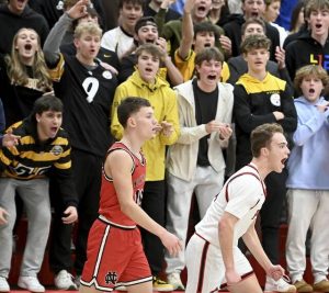 Fox Chapels Grant Fenton celebrates in front of the student section after hitting a 3-pointer at the third-quarter buzzer against New Castle on Friday, Jan. 9, 2026, at Fox Chapel. (Christopher Horner | TribLive)