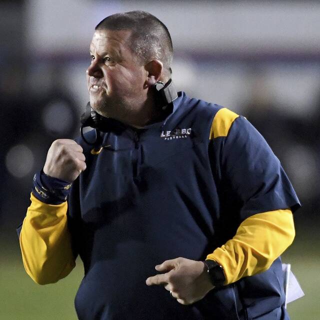 Mt. Lebanon coach Bob Palko celebrates a Blue Devils touchdown against St. Josephs Prep during the fourth quarter of the PIAA Class 6A state championship game on Saturday, Dec. 11, 2021, at Hersheypark Stadium. (Christopher Horner | TribLive)
