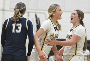 Penn-Traffords Torrie DeStefano celebrates with Raya Johnson after scoring an and-one against Franklin Regionals Katherine Yaniga during a WPIAL Class 5A first-round game Feb. 13. (Chaz Palla | TribLive)