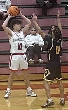Southmorelands Ty Whoric looks to pass while Alex Demchak of Shady Side Academy applies pressure Friday in the WPIAL Class 3A quarterfinals. (Dave Mackall | For TribLive)