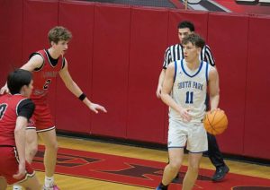 South Parks Luke Scarff handles the ball as Ligonier Valleys Michael Wisniewski (0) and Greyson Daugherty (2) defend in the WPIAL Class 3A quarterfinals Friday. (Brennan Valladares | For TribLive)