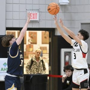 Upper St. Clairs Jake Foster shoots a 3-pointer over Norwins King Carver on Dec. 9, 2025. (Christopher Horner | TribLive)